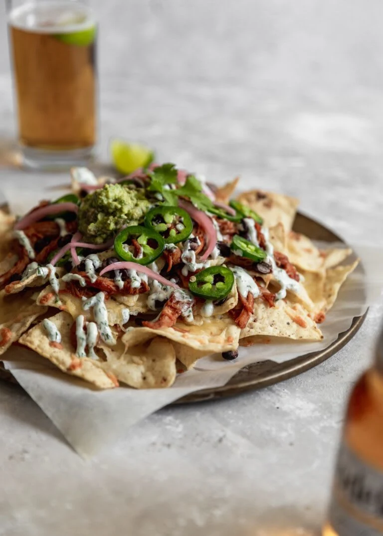 BBQ Chicken Nachos With Cilantro-Lime Crema