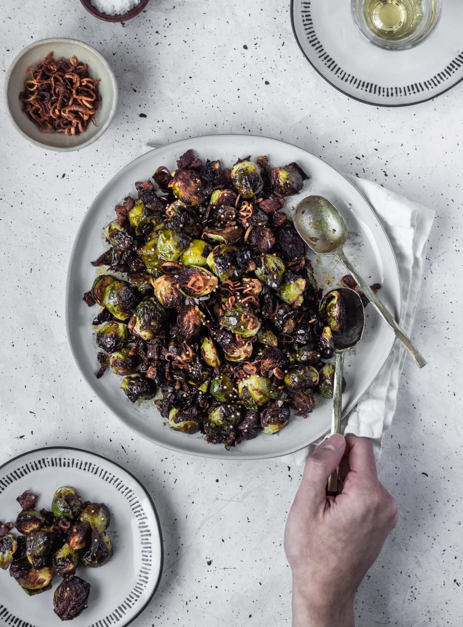 Crispy Brussels Sprouts With Fried Shallots, Bacon, & Dijon Vinaigrette