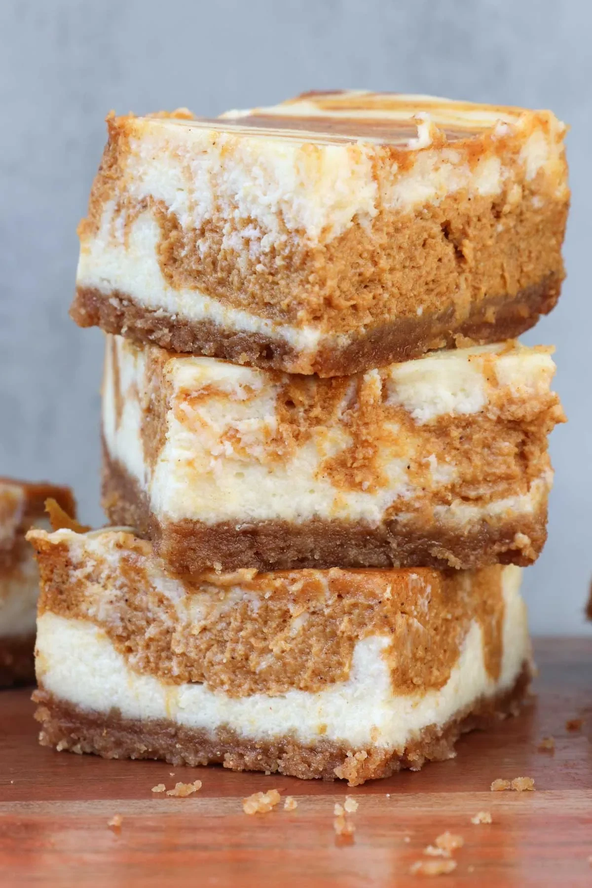 The Best Pumpkin Swirl Cheesecake Bars