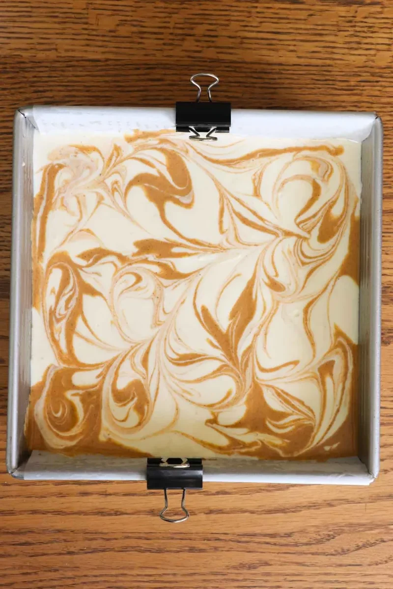The Best Pumpkin Swirl Cheesecake Bars
