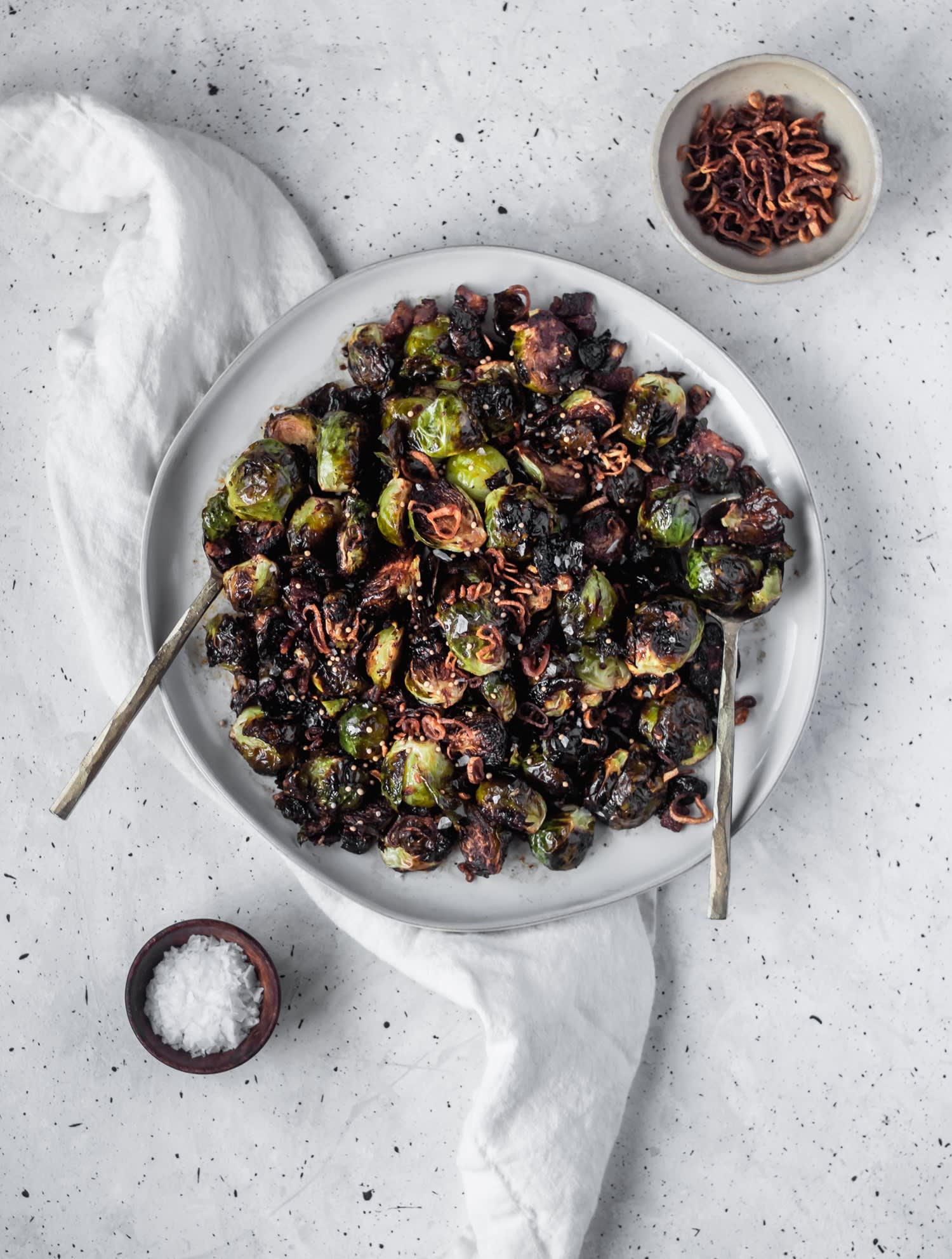 Crispy Brussels Sprouts With Fried Shallots, Bacon, & Dijon Vinaigrette