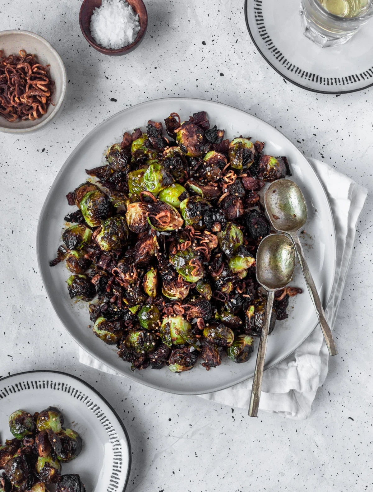 Crispy Brussels Sprouts With Fried Shallots, Bacon, & Dijon Vinaigrette