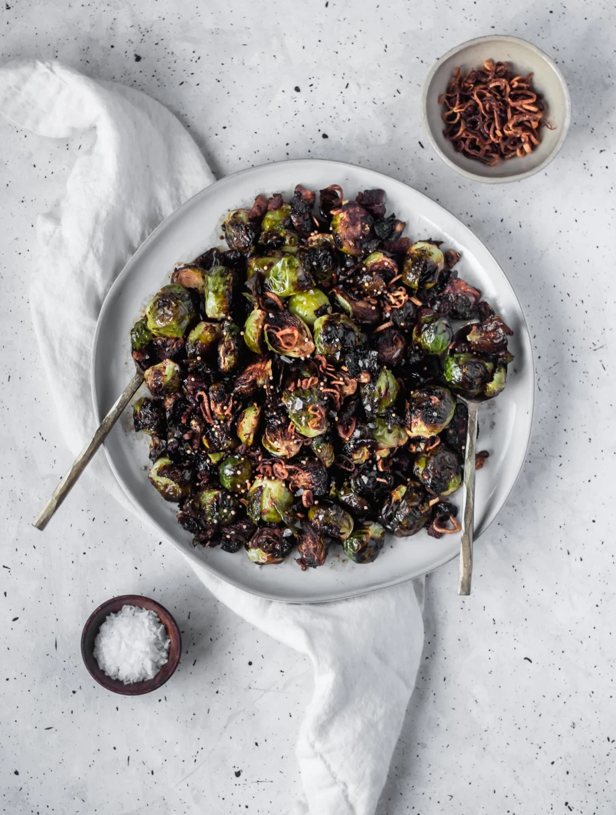 Crispy Brussels Sprouts With Fried Shallots, Bacon, & Dijon Vinaigrette