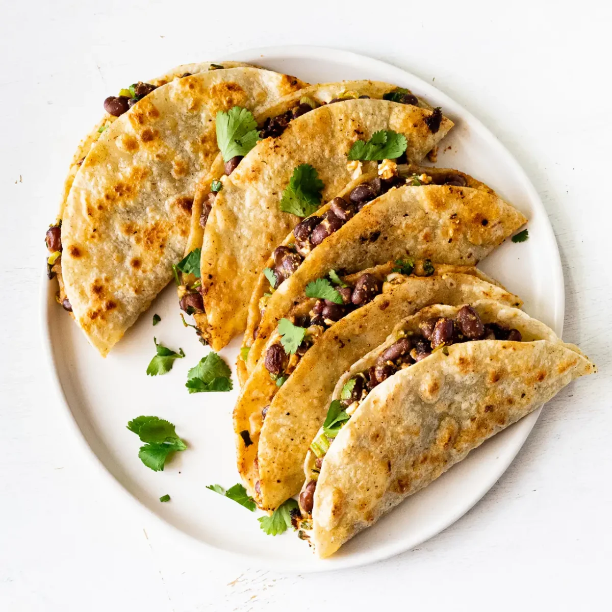 Crispy Black Bean Tacos with Feta and Lime