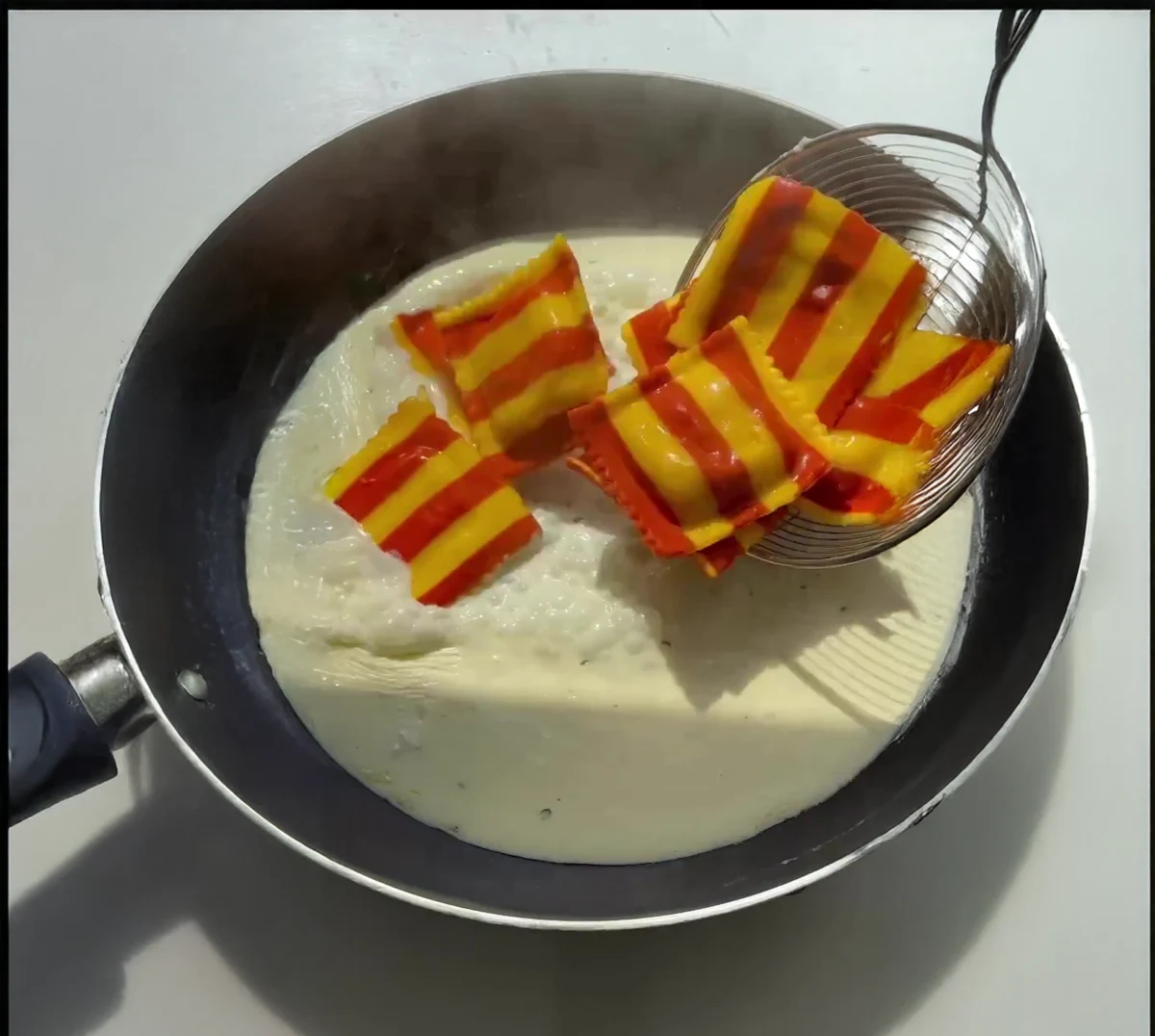 Lobster Ravioli in Alfredo Sauce