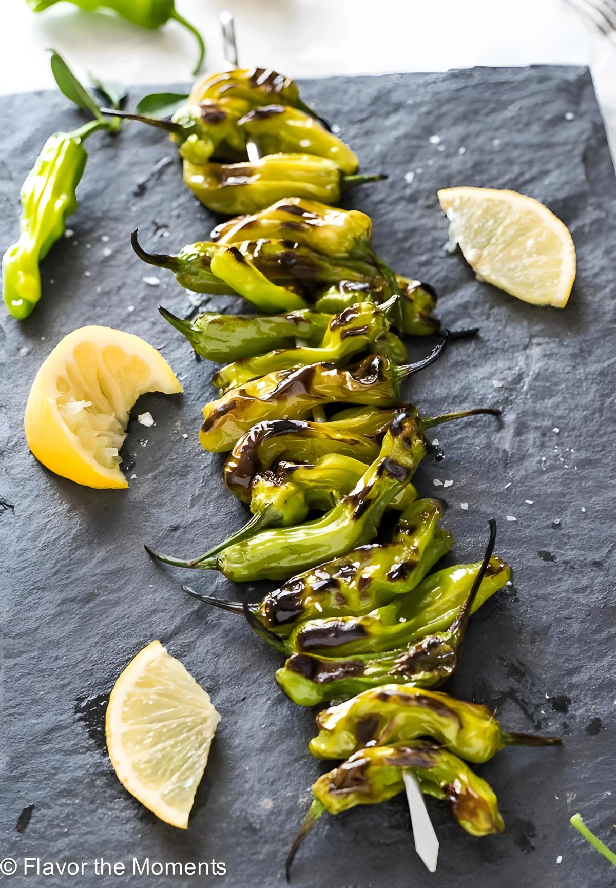 Grilled Shishito Peppers with Lemon and Sea Salt