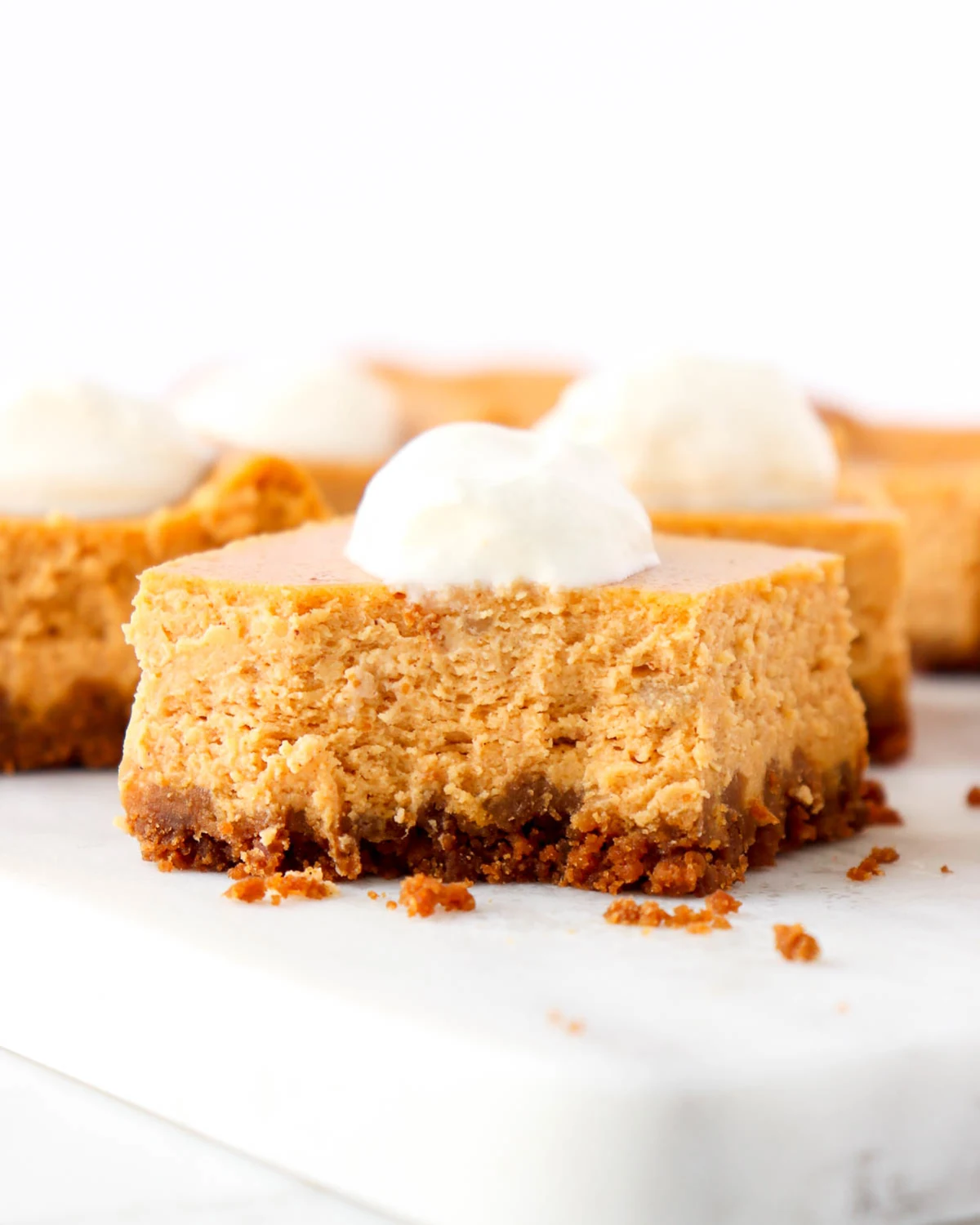 Pumpkin Cheesecake Bars with Gingersnap Crust