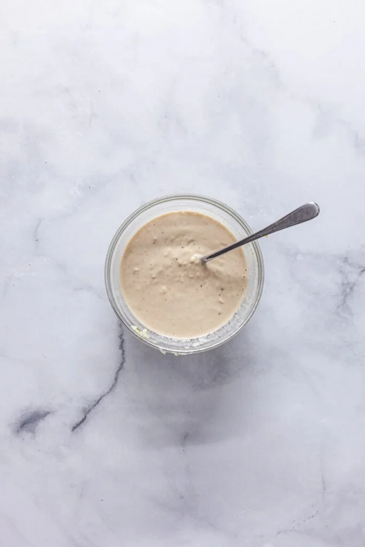 Harissa Roasted Cauliflower and Chickpeas with Tahini Sauce 
