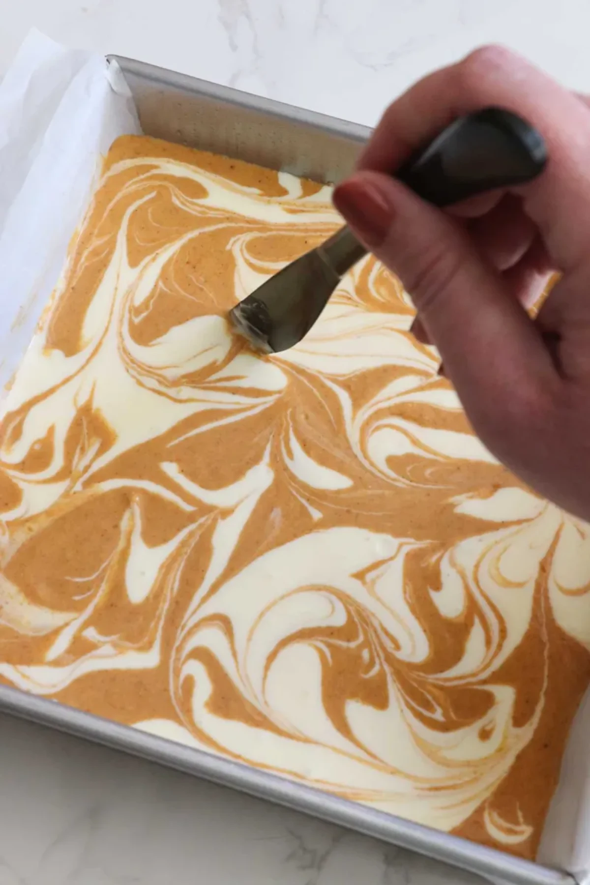 The Best Pumpkin Swirl Cheesecake Bars