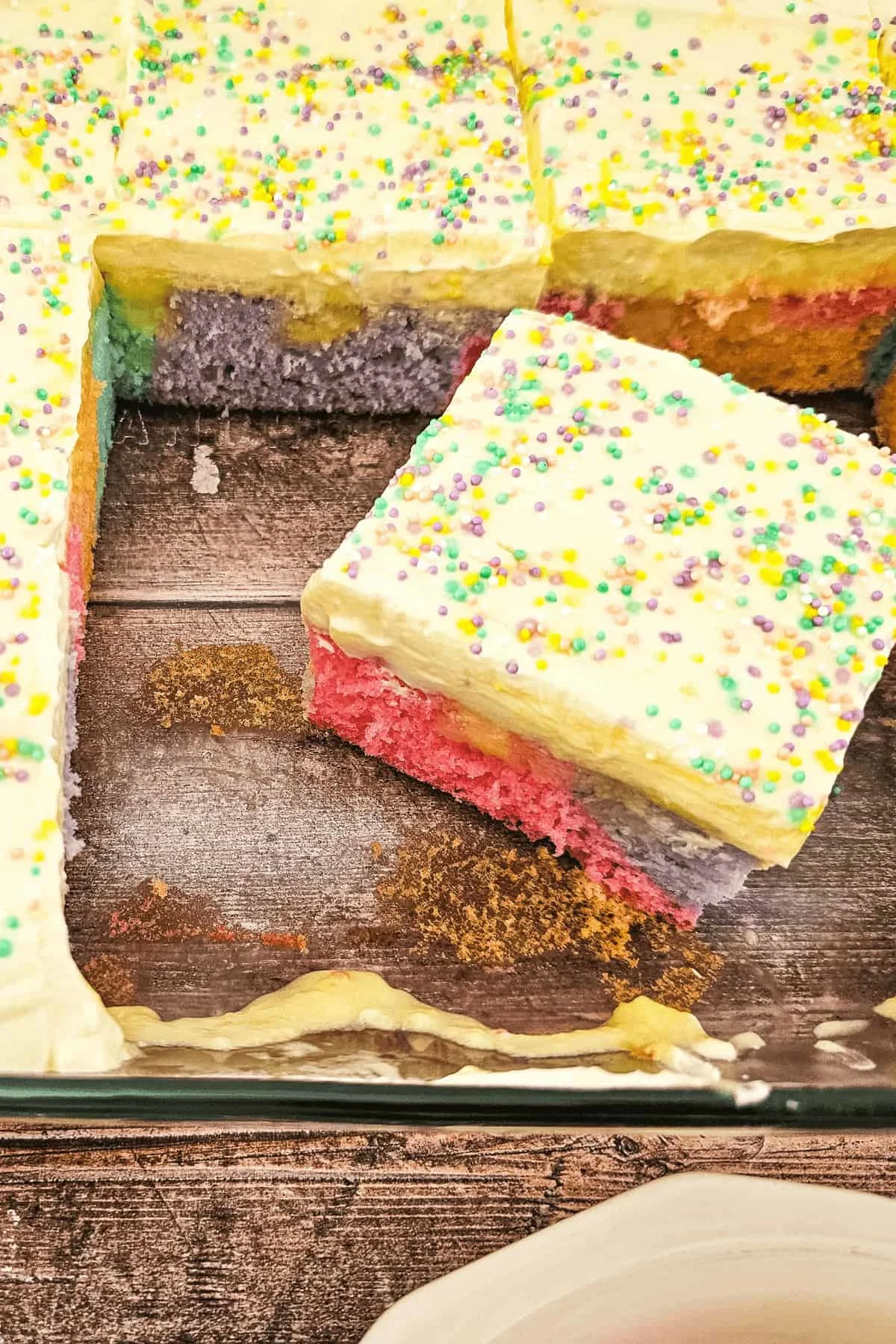 Rainbow Pudding Poke Cake