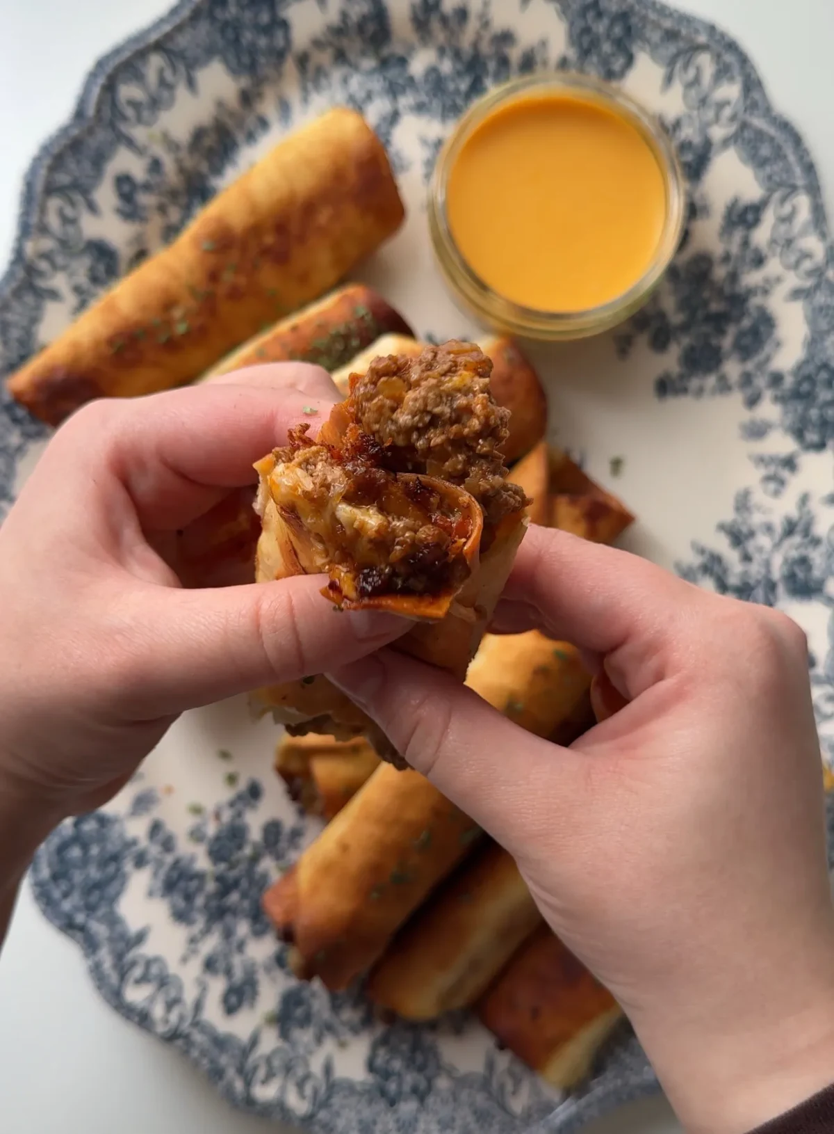 Cheesy Beef Taquitos with Cheddar Sauce