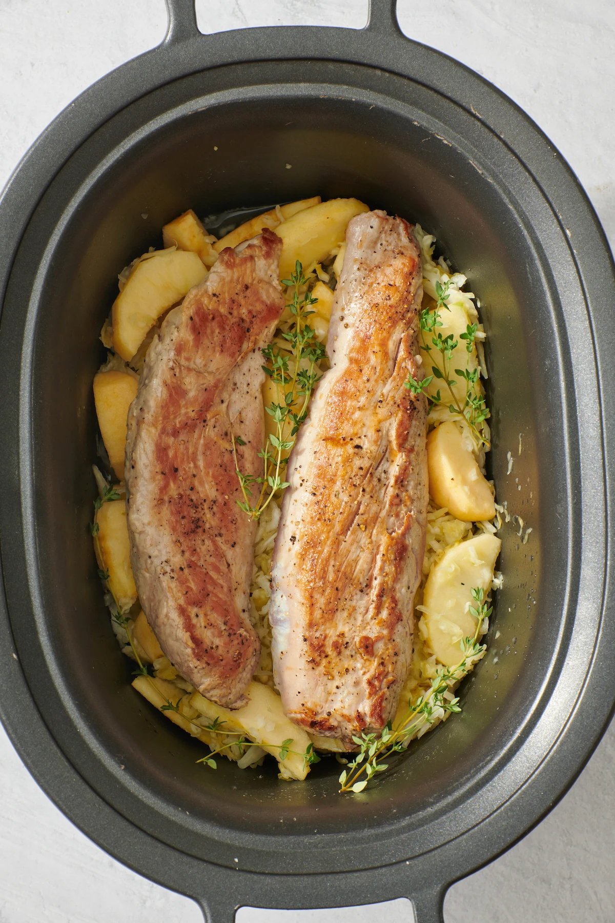 Slow Cooker Pork Tenderloin with Apples and Sauerkraut