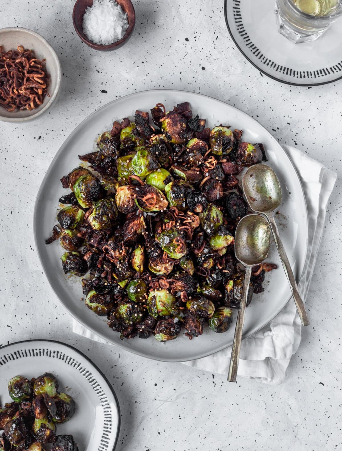 Crispy Brussels Sprouts With Fried Shallots, Bacon, & Dijon Vinaigrette
