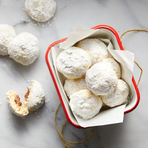 Nutella-Stuffed Hazelnut Snowball Cookies cover