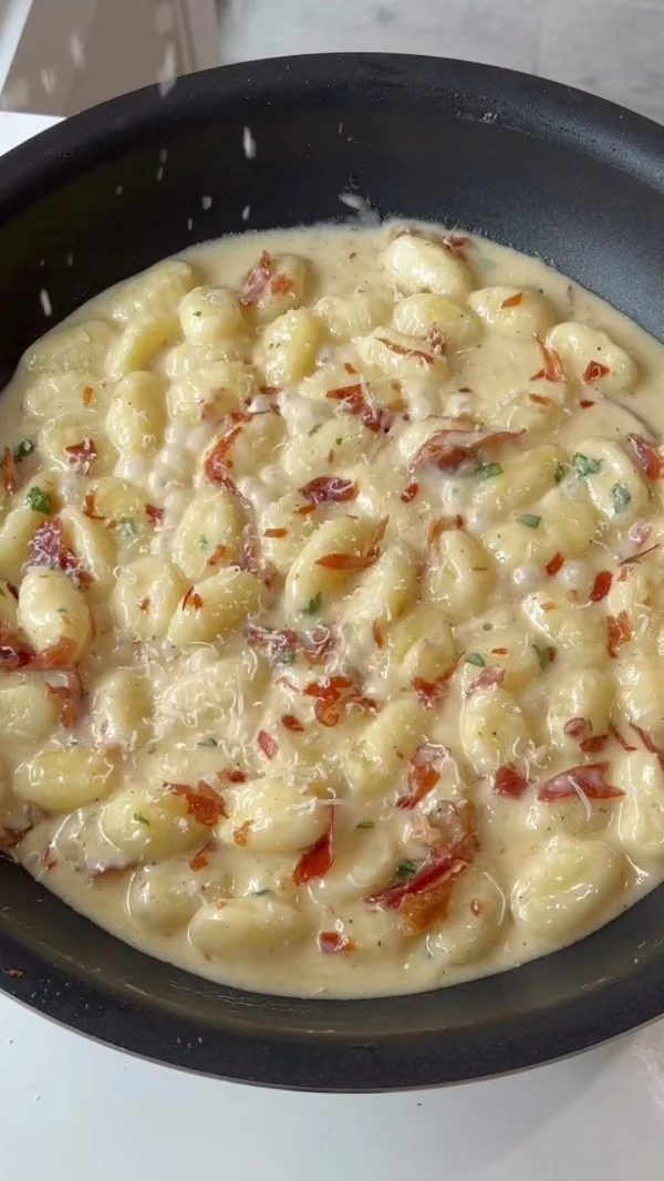 Truffle Cream Gnocchi with Crispy Prosciutto & Roasted Garlic cover