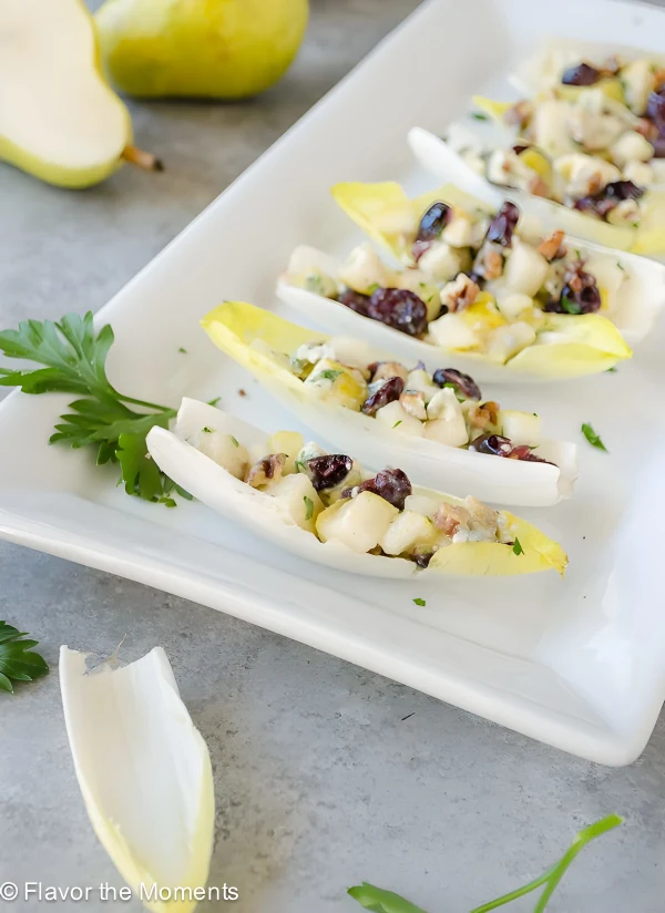 Endive Salad Bites with Pears, Blue Cheese, and Pecans cover
