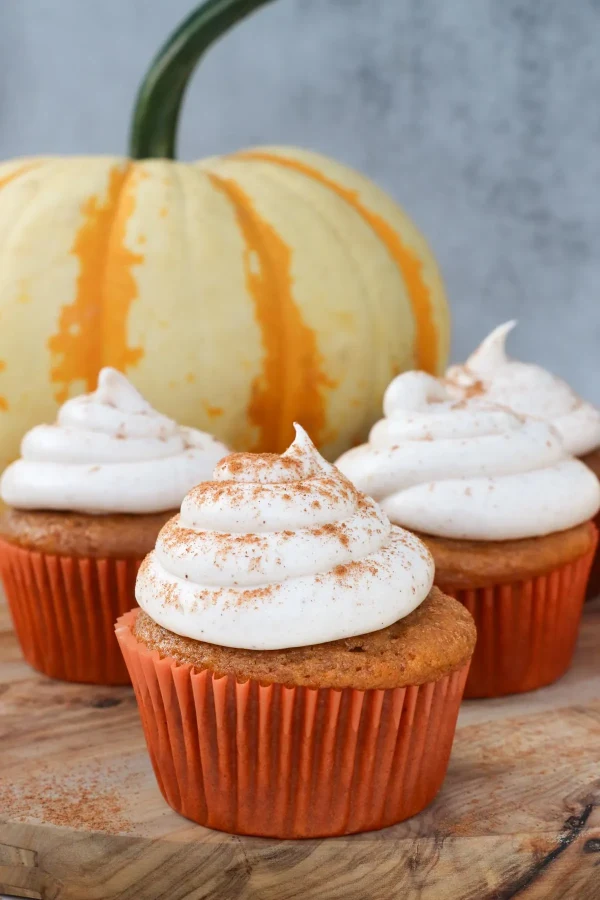 Pumpkin Cupcakes with Cinnamon Cream Cheese Frosting cover