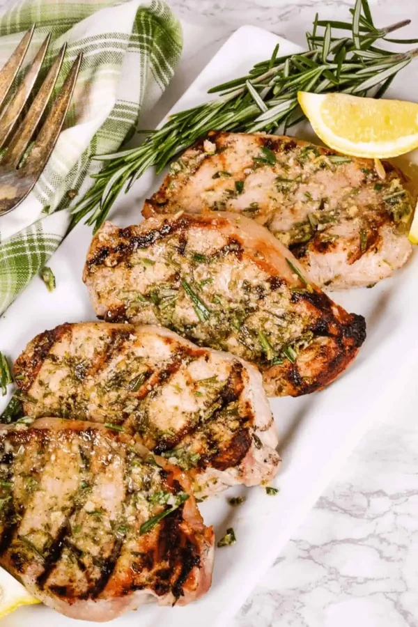 Grilled Boneless Pork Chops with Garlic and Rosemary cover